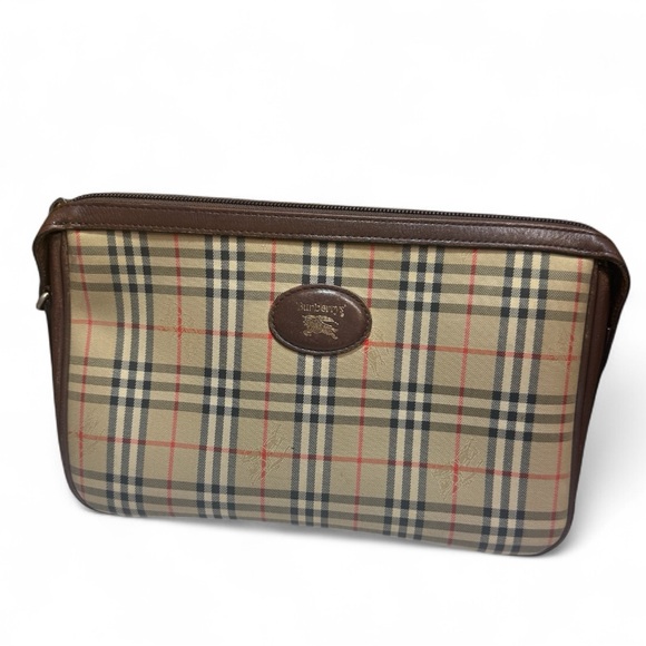 Burberry Handbags - Burberrys’ Vintage clutch wristlet